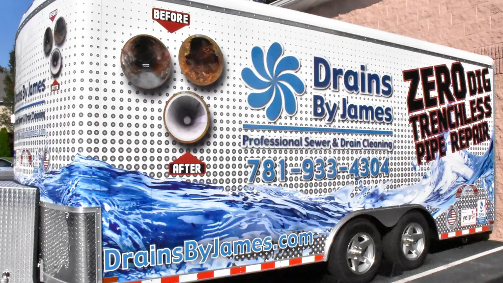 Trailer wrap with before and after pipe photos and the zero dig trenchless lettering